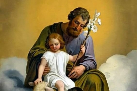 São José com o Menino Jesus e um lírio branco, sentado sobre nuvens