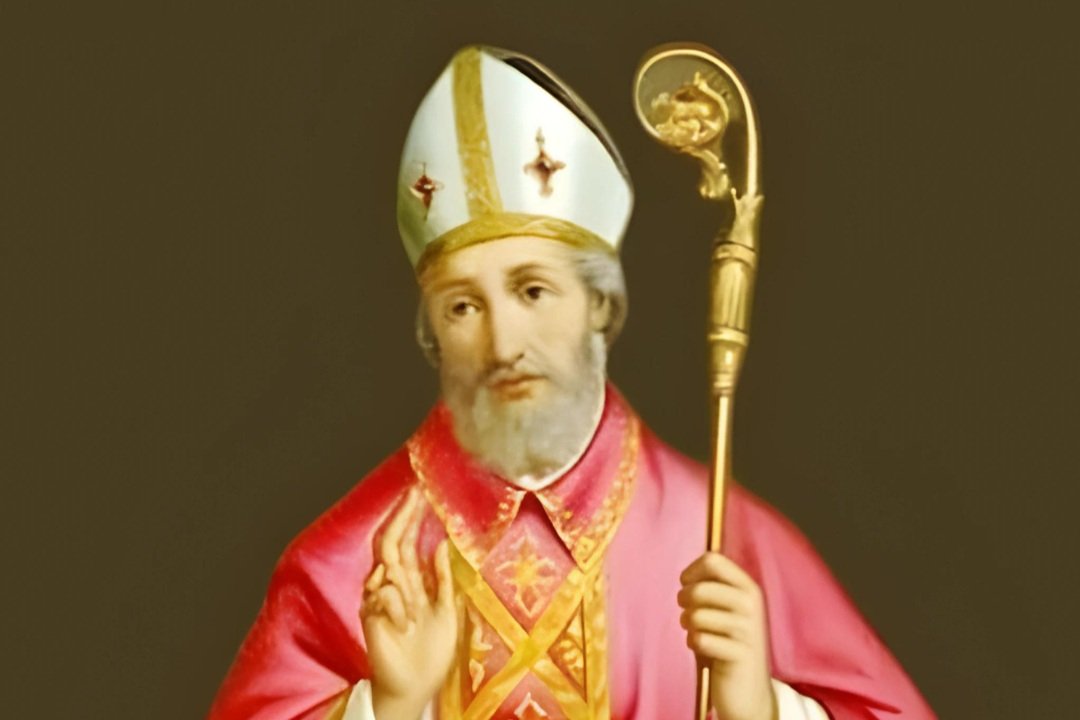 Santo Anselmo, bispo de mitra e paramentos vermelhos, segurando um báculo
